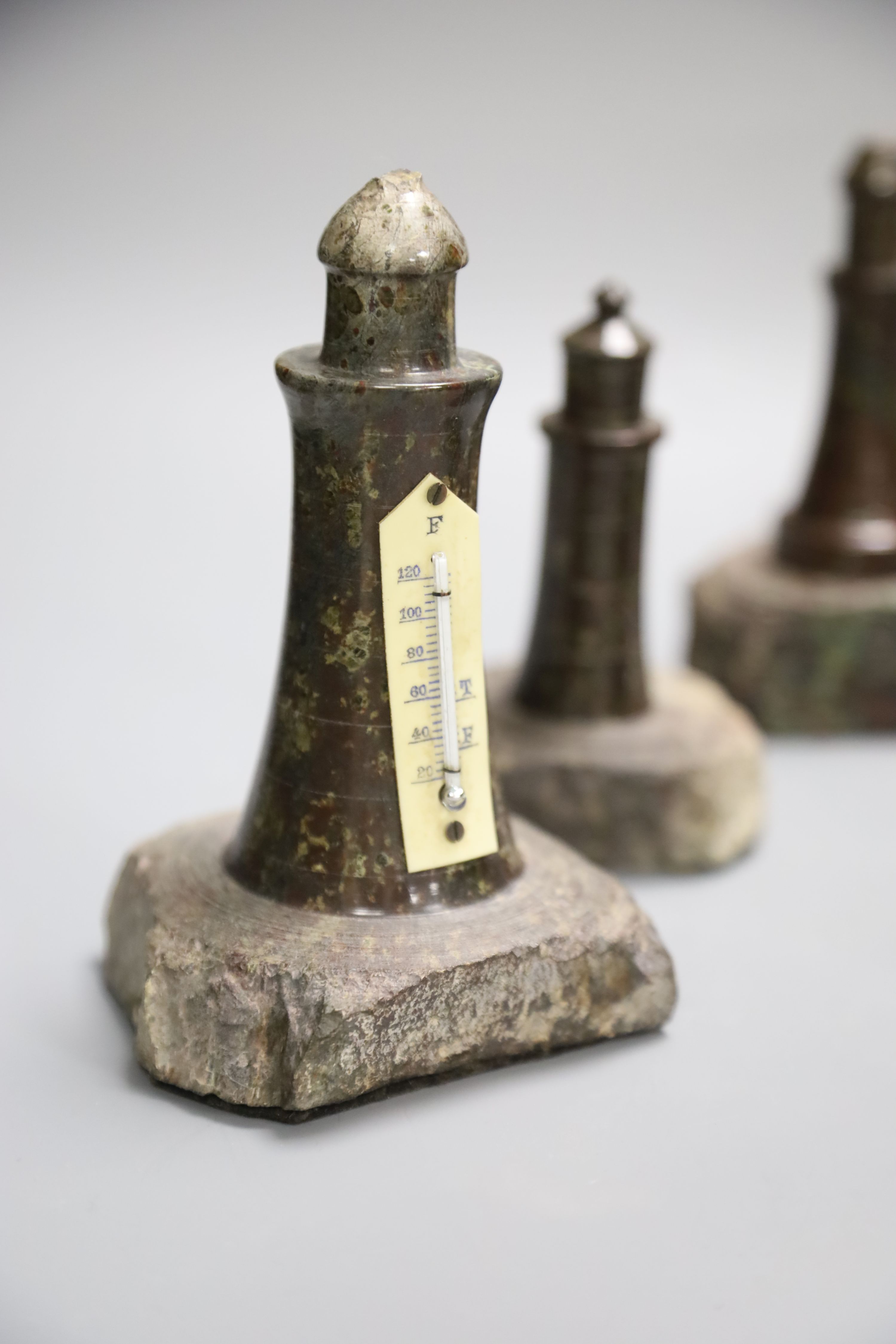 Mixed collectables including five Serpentine lighthouses, pewter owl, cold painted model of an Alsatian etc., tallest 21cm